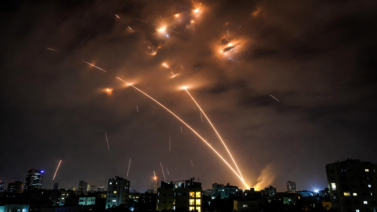 Tel Aviv night sky filled with Iron Dome interceptor missile trails